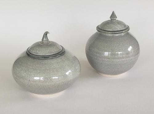 Two lidded stoneware pots