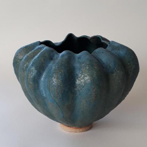 Convoluted pot with blue-green glaze by Karen George.